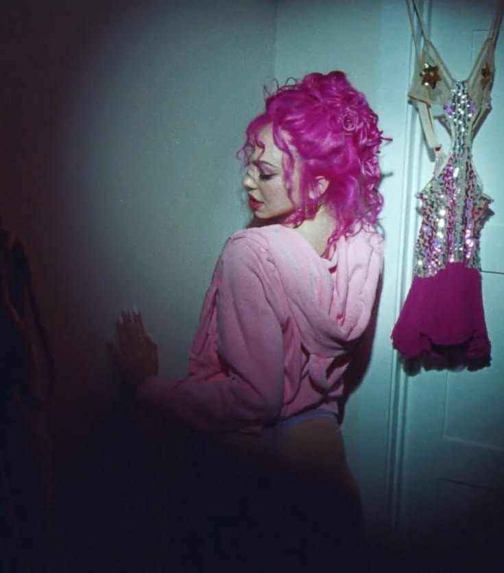 Adéla portrait emphasizing theatrical Pop Sleaze